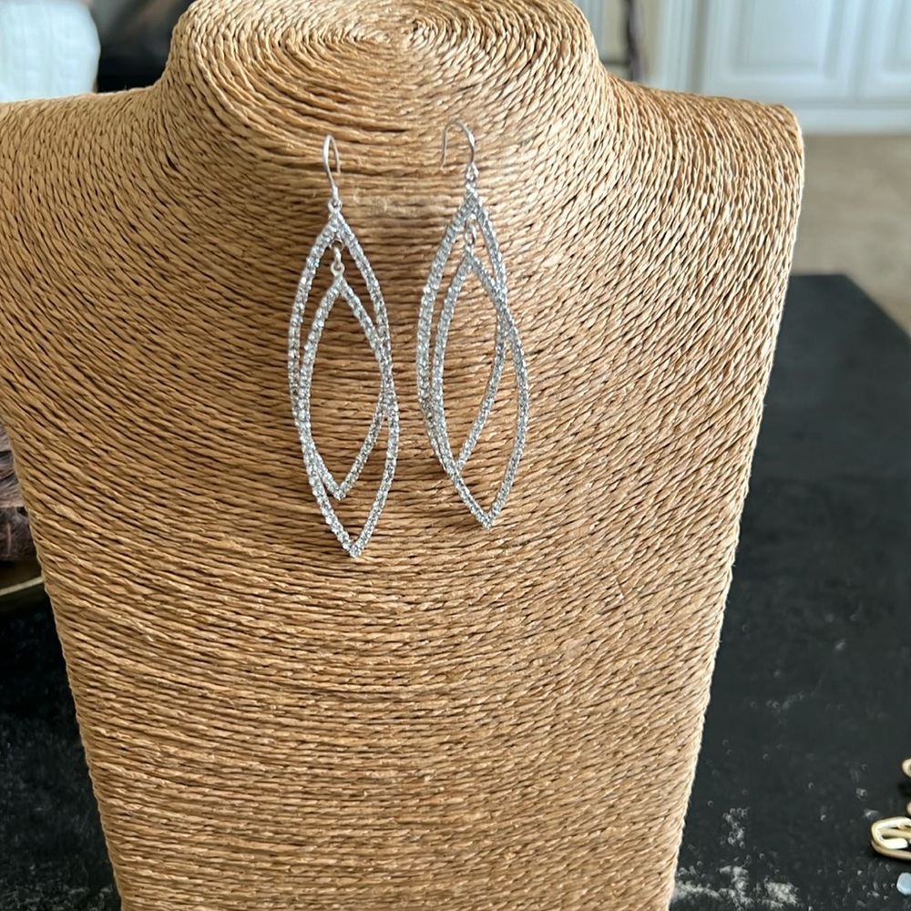 Crystal open drop earrings.